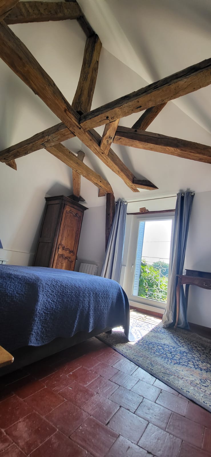 La chambre sous les poutres